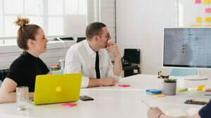 Choosing the Best Commercial Cleaning Company: Office meeting with a man and a woman.