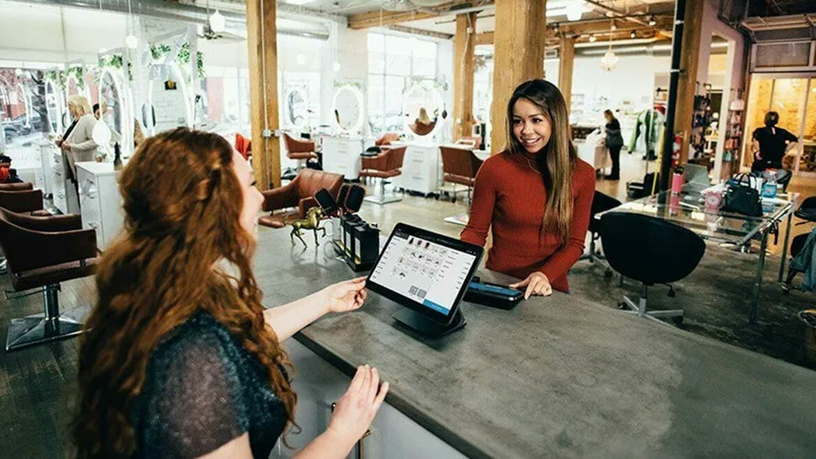 Businesses That Utilize Facilities Services: Women with iPads at a Salon Reception