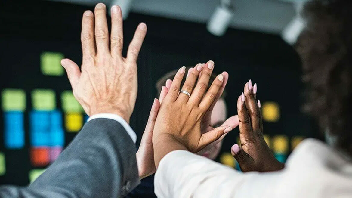 Commercial Cleaning Benefits for Employees: Colleagues Celebrating in Stylish Attire