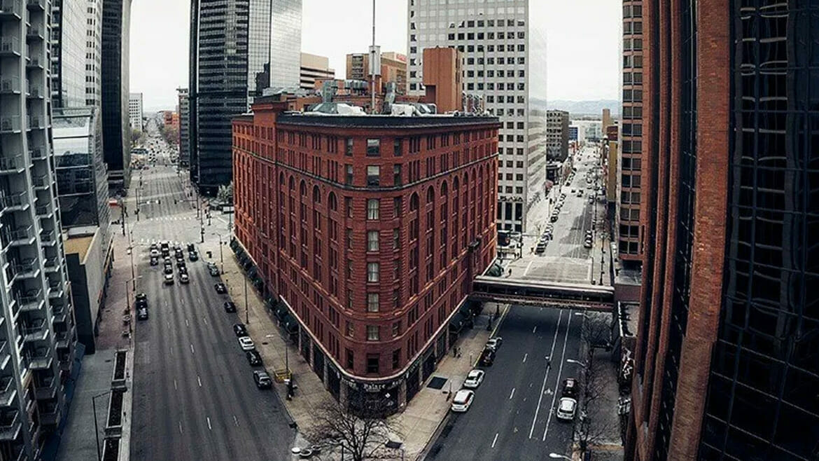 Outsource Office Cleaning in Denver: Downtown View with Triangular Building